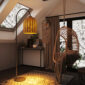 Cozy Reading Nook with Rattan Floor Lamp in Loft